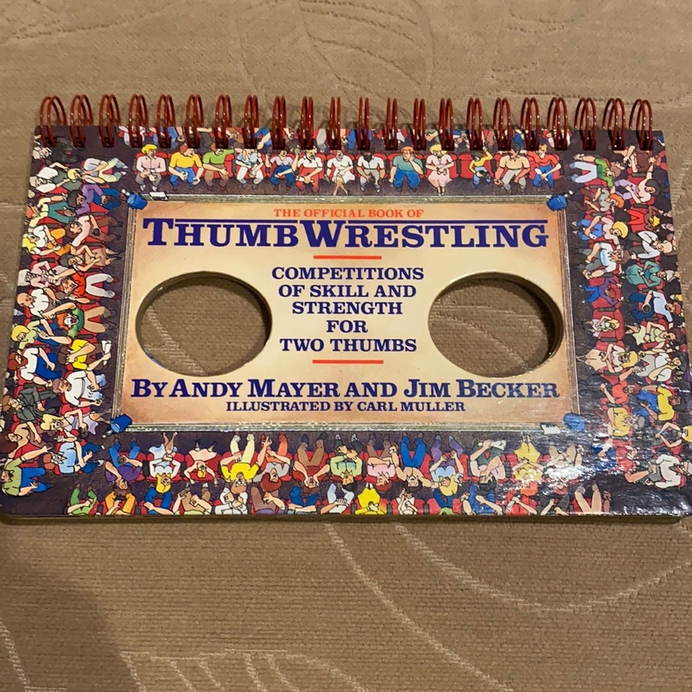 The Official Book of Thumb Wrestling Hardcover Book